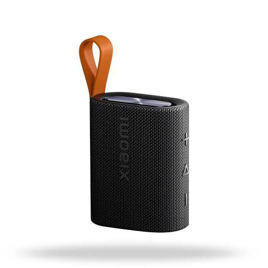Portable Xiaomi Bluetooth speaker with orange carry strap, compact wireless audio device