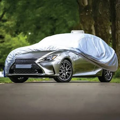 Green Lion Solar Auto Car Cover Grey protecting a parked car