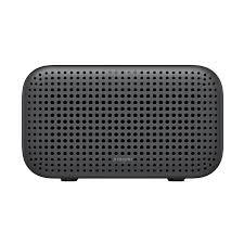 Compact black portable Bluetooth speaker with perforated grille design