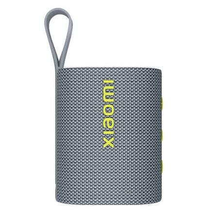 Xiaomi portable Bluetooth speaker with gray mesh design and yellow logo, compact and lightweight for outdoor use