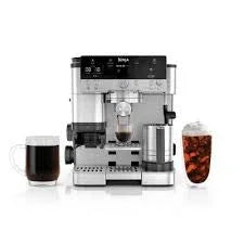 Automatic espresso machine brewing coffee with milk frother, perfect for home use