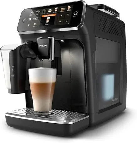 Philips espresso machine brewing latte with digital touchscreen and milk frother
